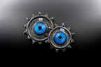 Bikone Forged Carbon Pulley Wheels, the pair side by side on a black background, road bike drivetrain components